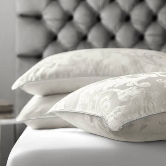Close-up of the pillow shell fabric texture and stitched seam edge